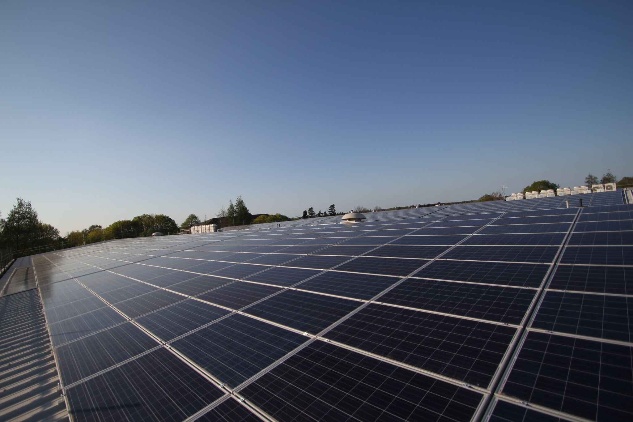 Solar panels installed on a warehouse roof